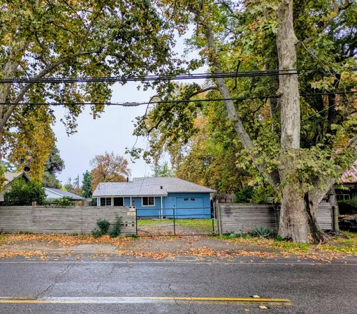 a front view of a house with yard