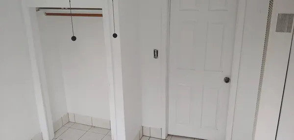 a bathroom with a toilet and a sink