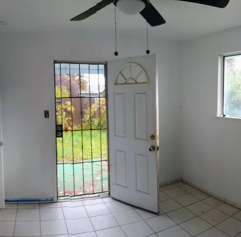 an empty room with windows