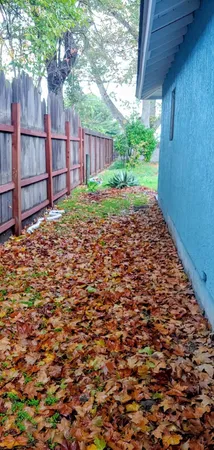 a backyard of a house with lots of green space