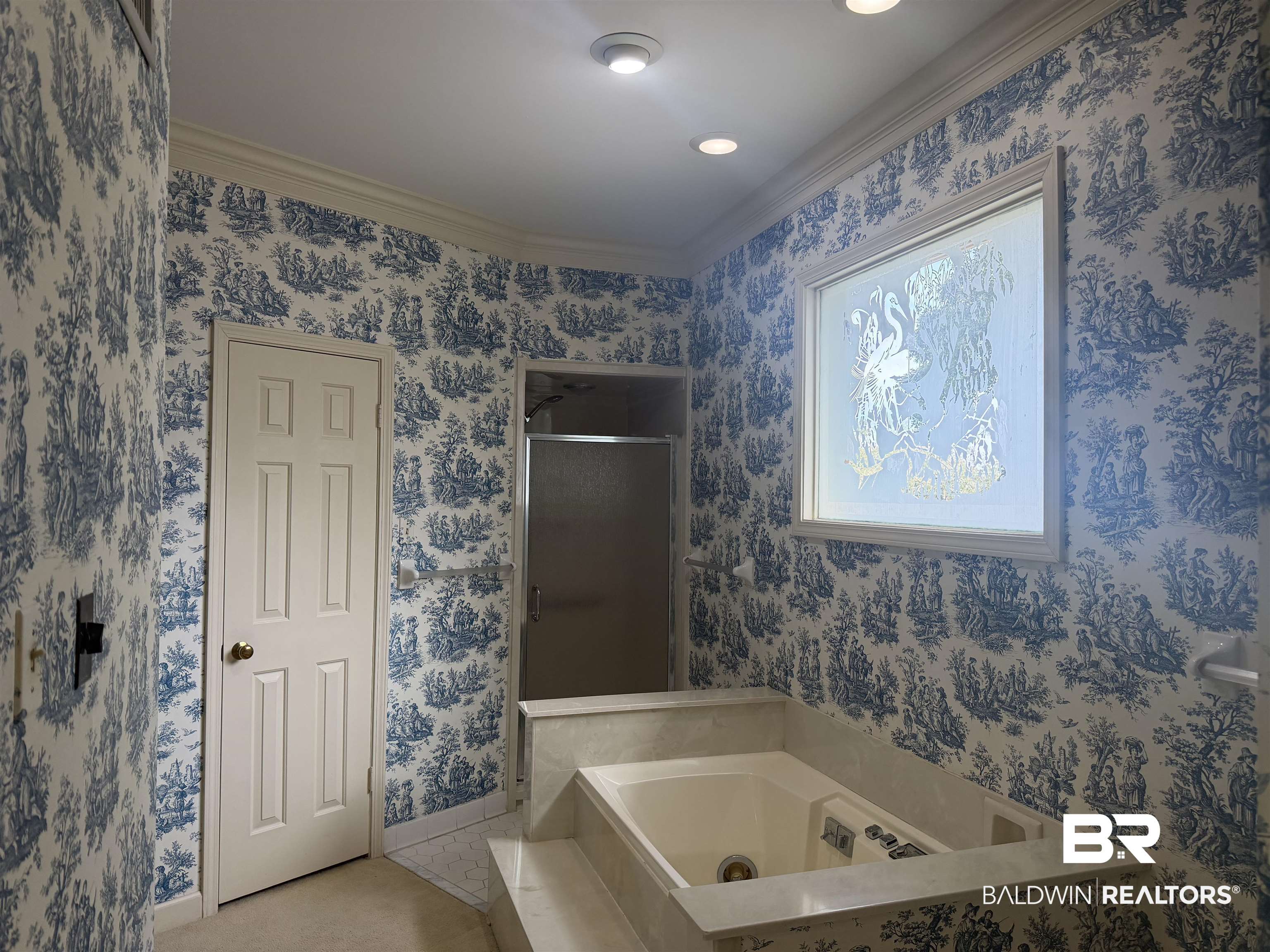53 Warwick Road Mobile, AL 36608 - Photo 39 of 45 Primary bathroom with a stall shower, a garden tub, and ornamental molding