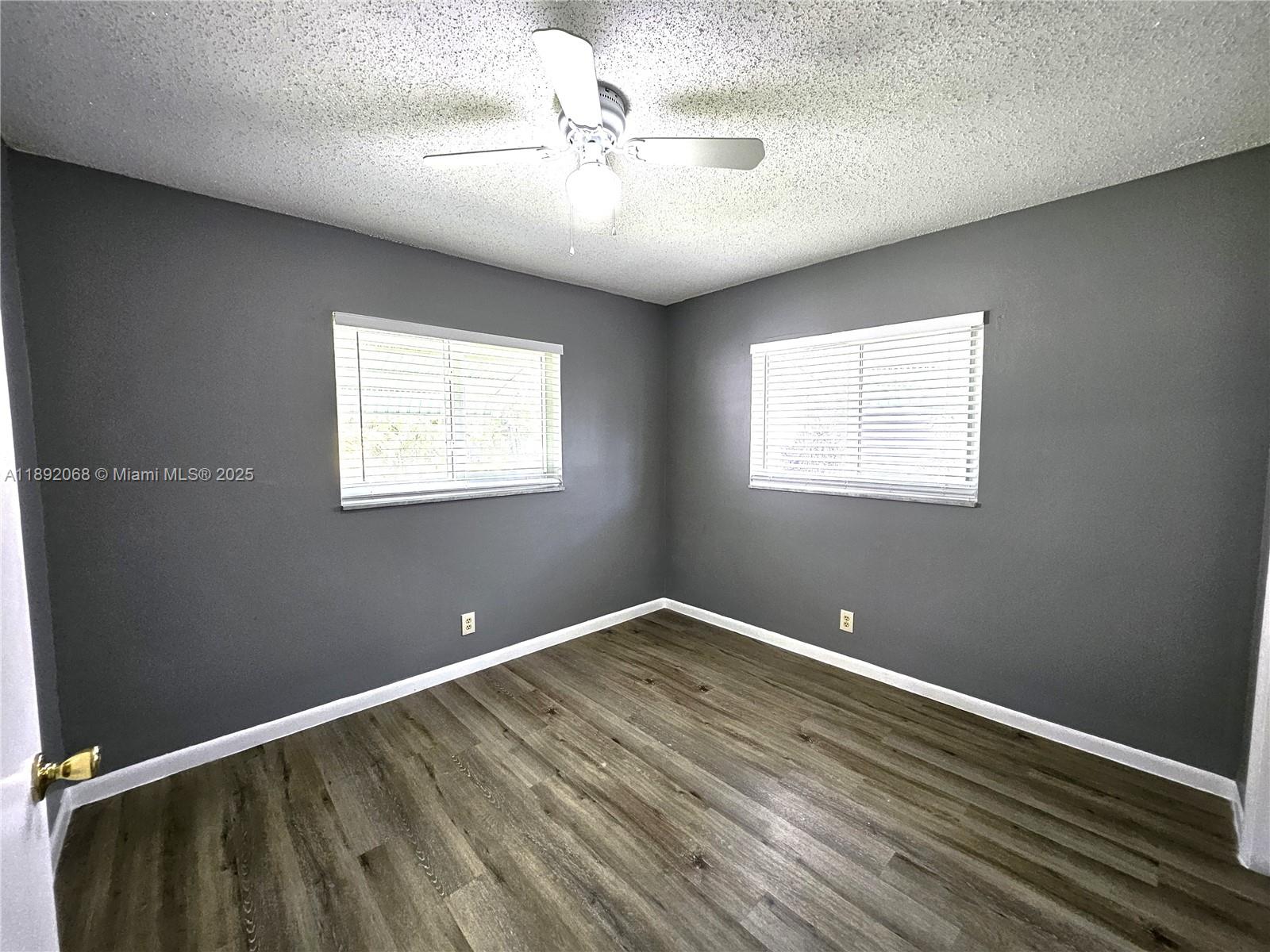 1040 Northwest 73rd Terrace Margate, FL 33063 - Photo 20 of 41 a view of room with window and ceiling fan