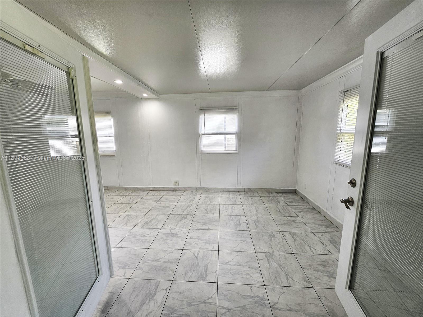 1040 Northwest 73rd Terrace Margate, FL 33063 - Photo 28 of 41 a view of an empty room