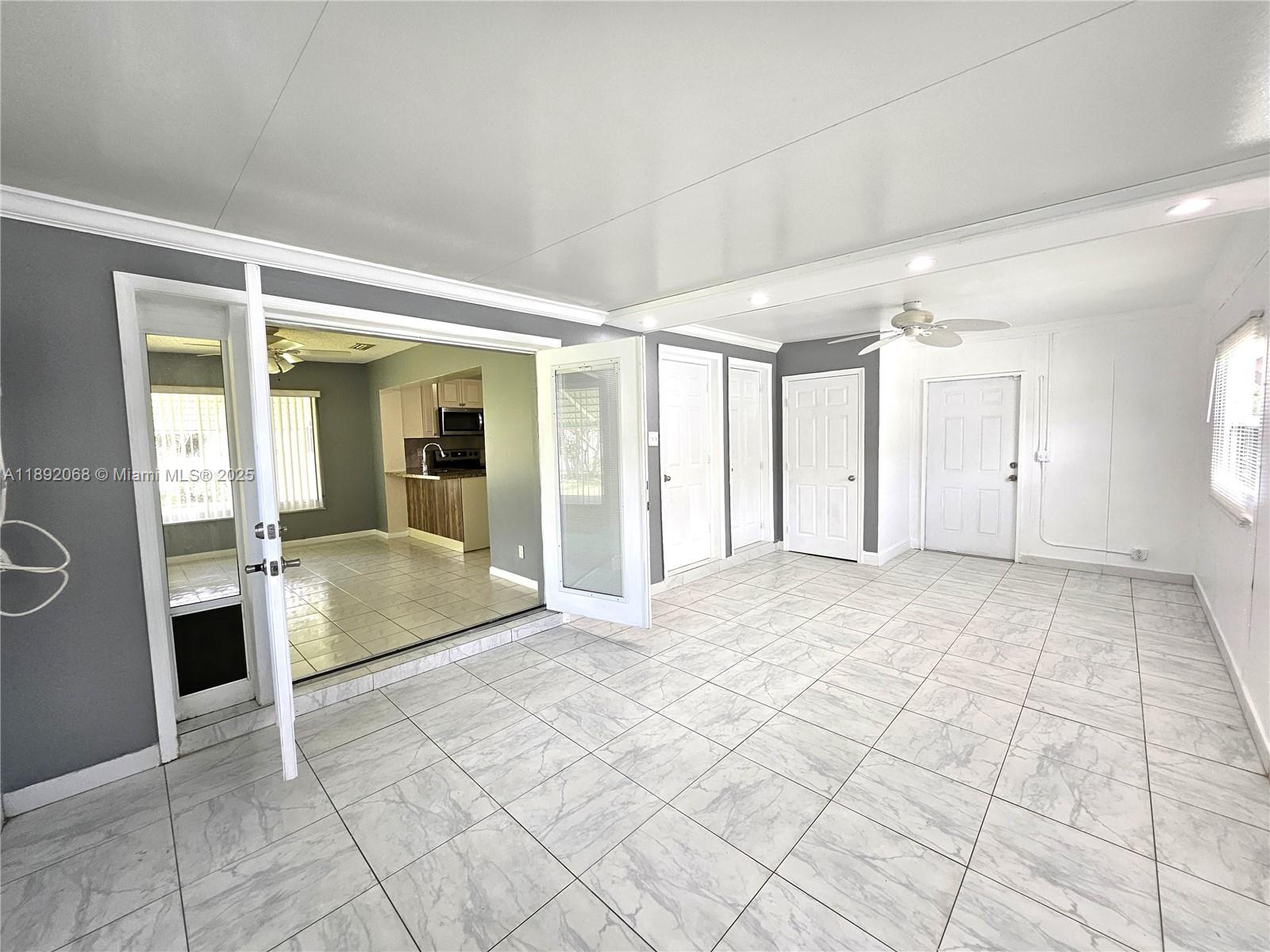 1040 Northwest 73rd Terrace Margate, FL 33063 - Photo 5 of 41 a view of an entryway of a house