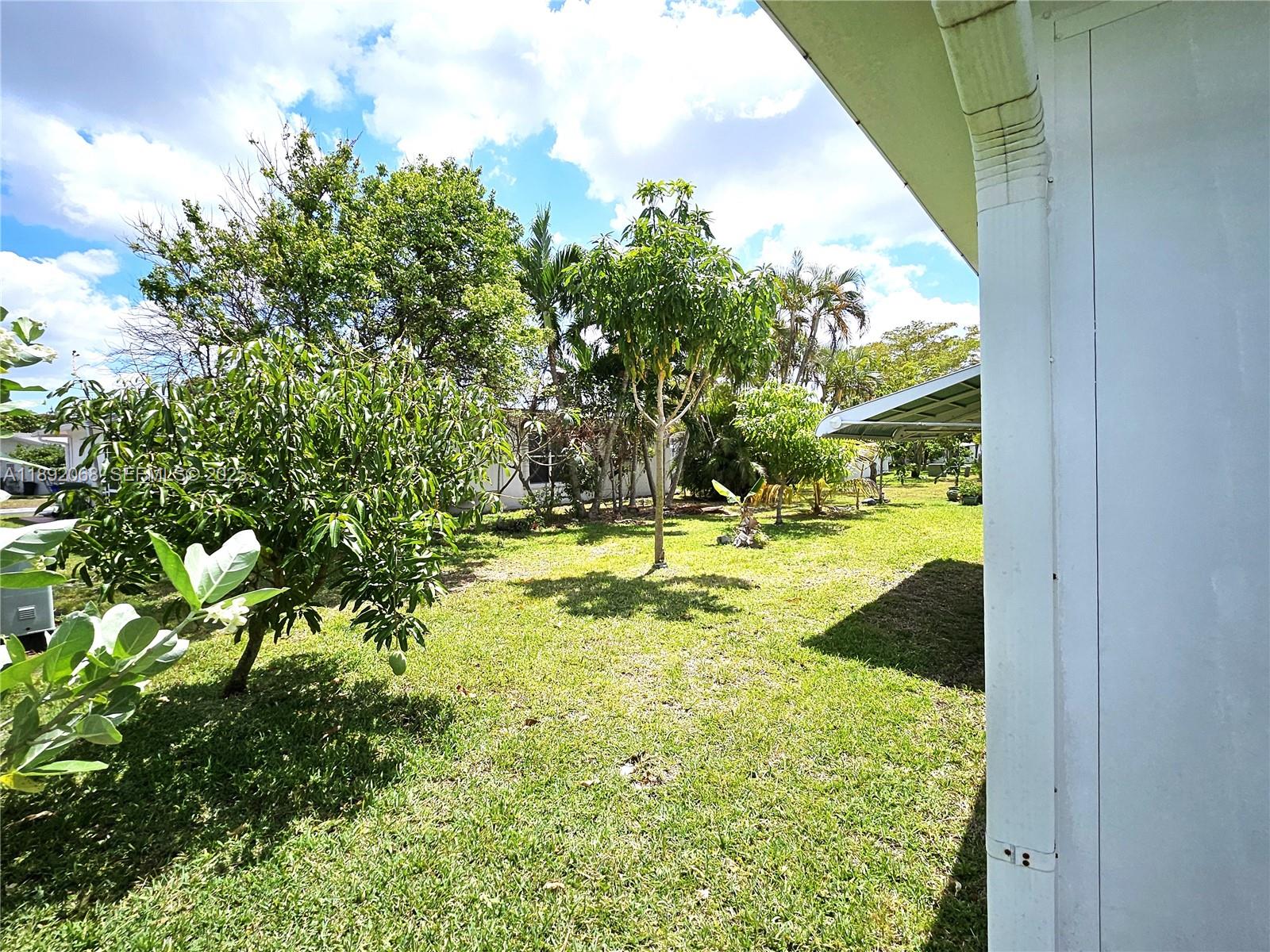 1040 Northwest 73rd Terrace Margate, FL 33063 - Photo 7 of 41 a view of swimming pool from a window