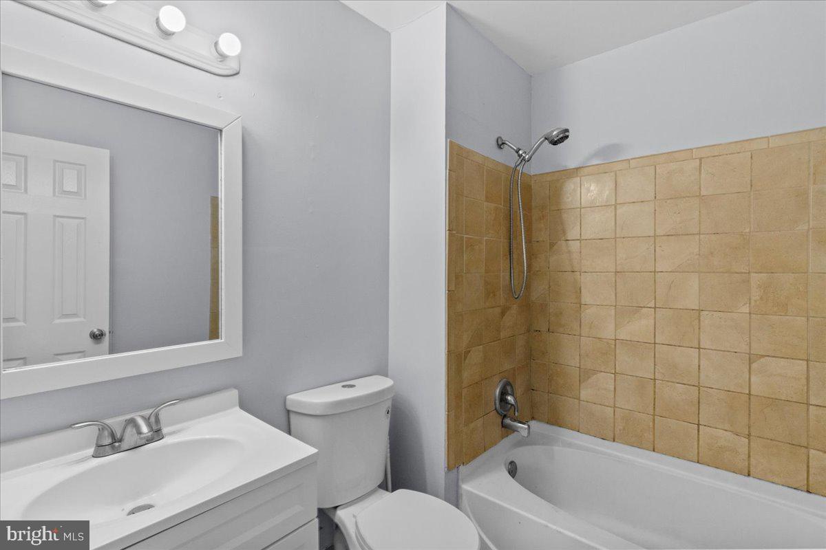 10 Longbow Court Sicklerville, NJ 08081 - Photo 16 of 26 a bathroom with a sink a toilet and shower