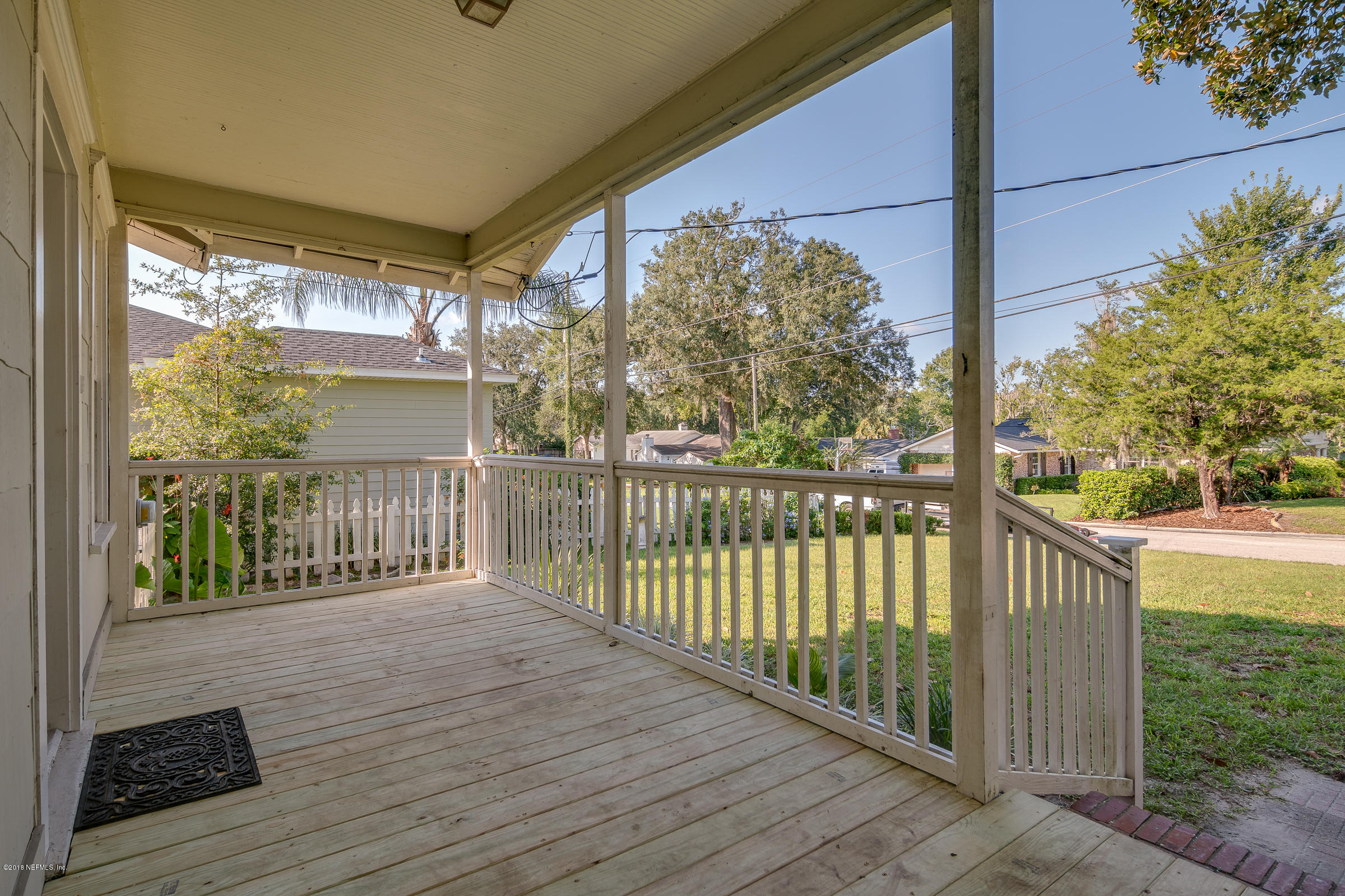 1509 Mayfair Road Jacksonville, FL 32207 - Photo 5 of 22 a view of a balcony with wooden floor