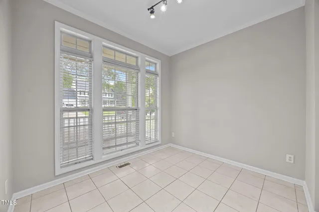 a view of an empty room with window