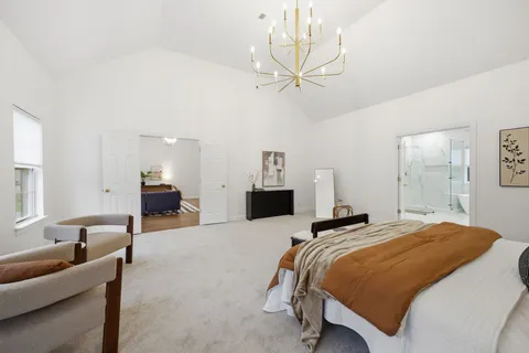 a bathroom with a shower and a toilet