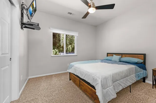 a view of livingroom with furniture and windows