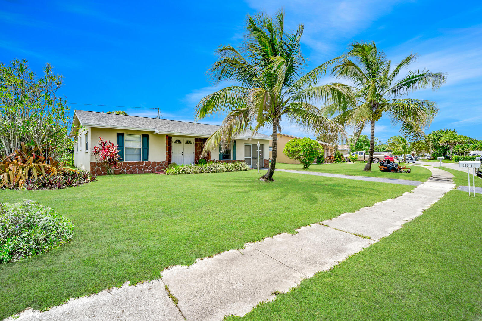 22243 Southwest 64th Way Boca Raton, FL 33428 - Photo 1 of 47 a view of a house with a backyard