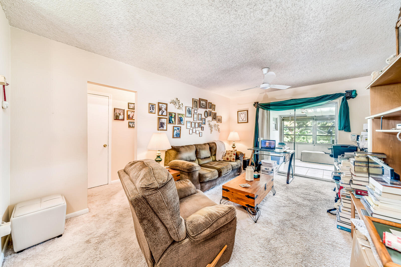 22243 Southwest 64th Way Boca Raton, FL 33428 - Photo 19 of 47 a living room with furniture and a large window