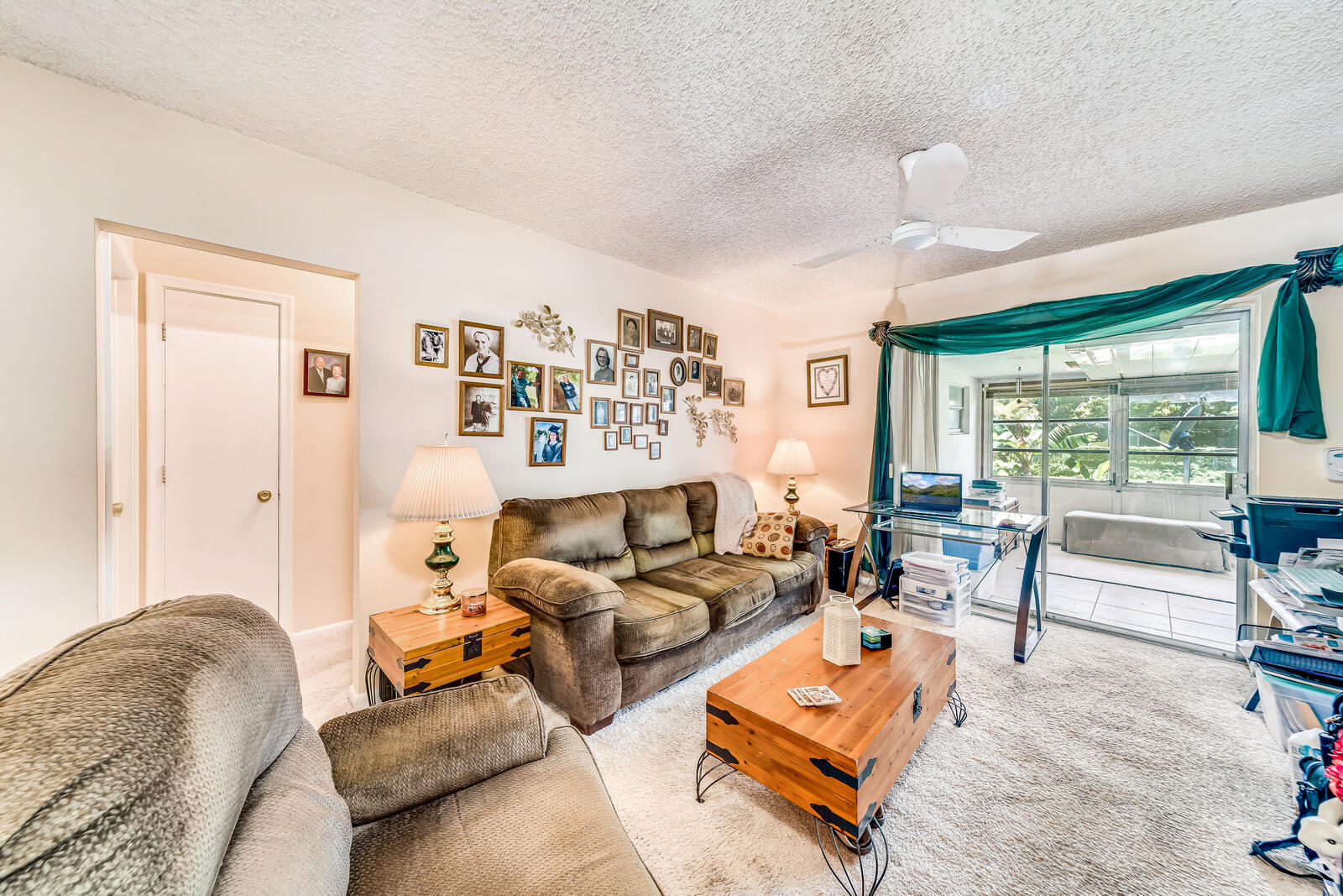 22243 Southwest 64th Way Boca Raton, FL 33428 - Photo 20 of 47 a living room with furniture and a large window
