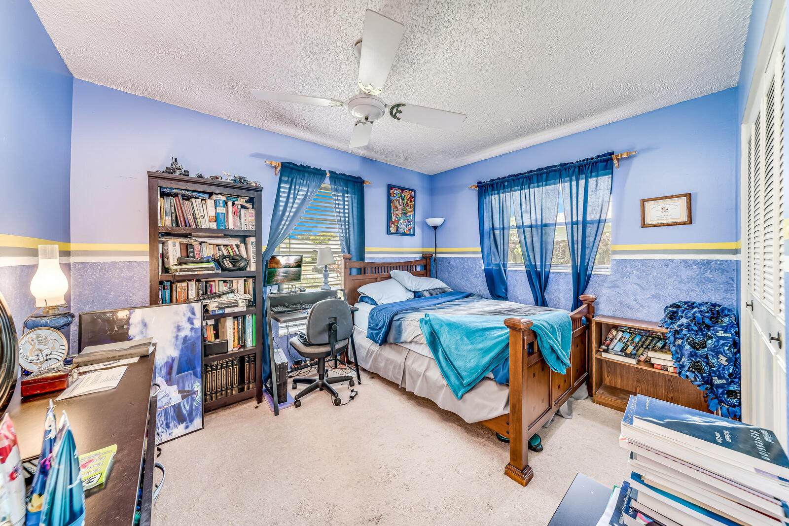 22243 Southwest 64th Way Boca Raton, FL 33428 - Photo 27 of 47 a bedroom with furniture and a gym equipment