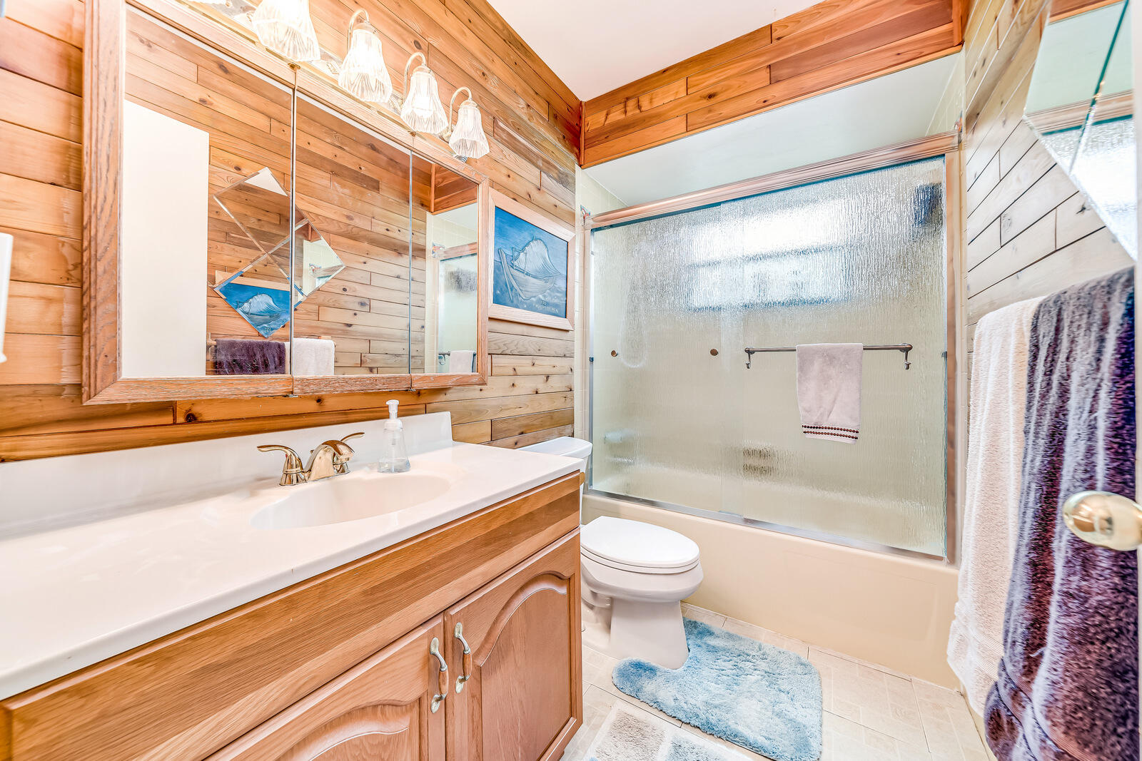 22243 Southwest 64th Way Boca Raton, FL 33428 - Photo 29 of 47 a bathroom with a sink a toilet and shower