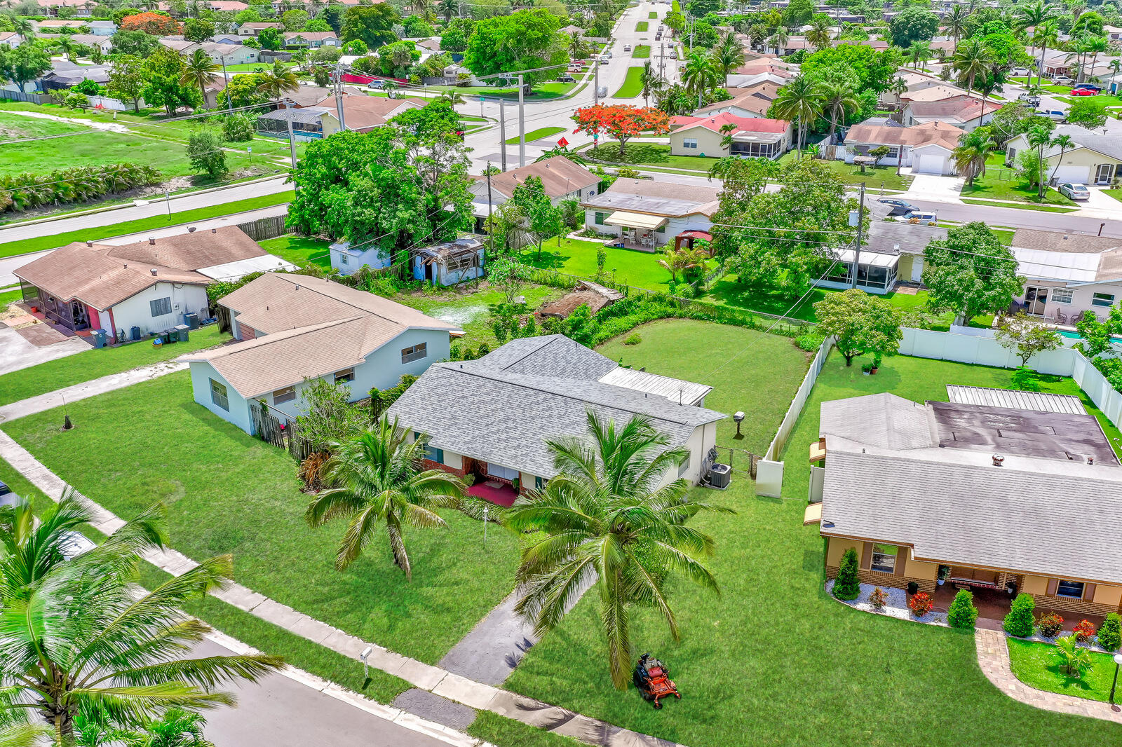 22243 Southwest 64th Way Boca Raton, FL 33428 - Photo 43 of 47 an aerial view of a house with garden space and street view