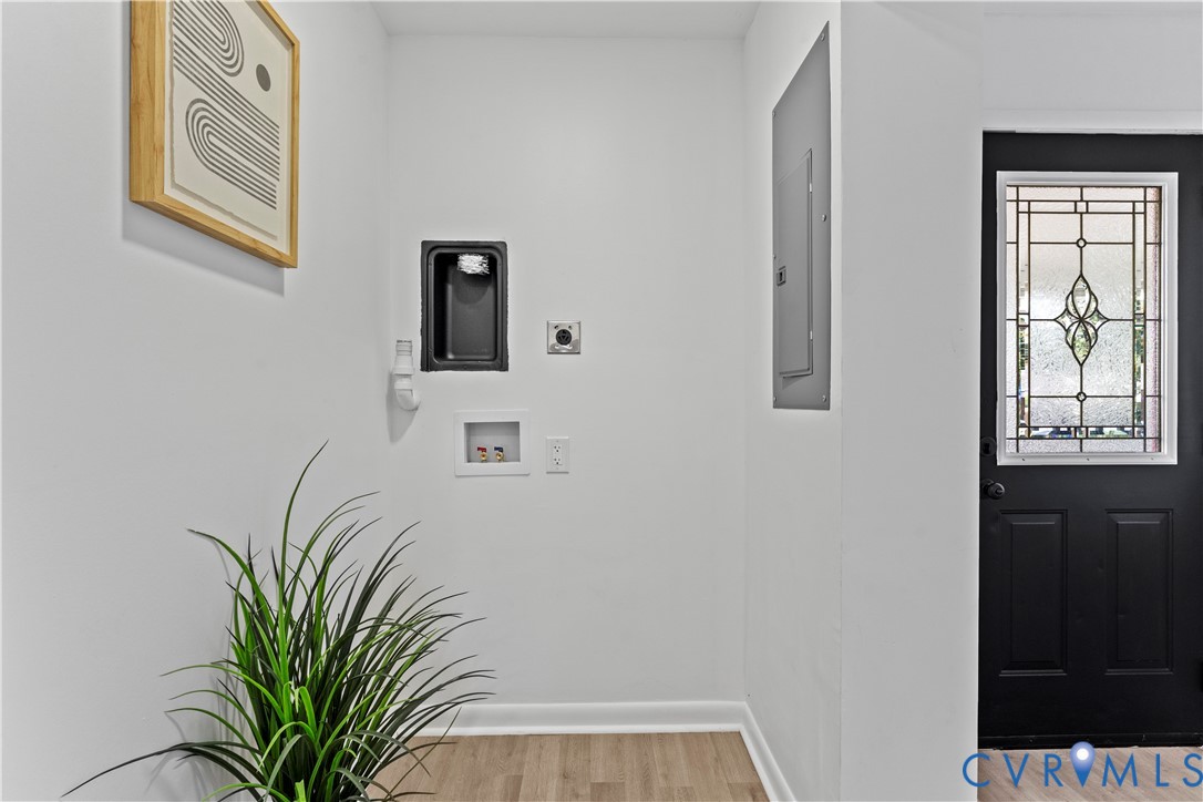 2000 Cleary Road Richmond, VA 23223 - Photo 15 of 28 Laundry room featuring light wood-style flooring,