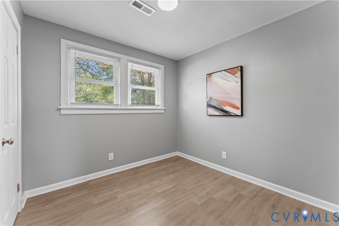2000 Cleary Road Richmond, VA 23223 - Photo 23 of 28 Empty room featuring light wood finished floors an