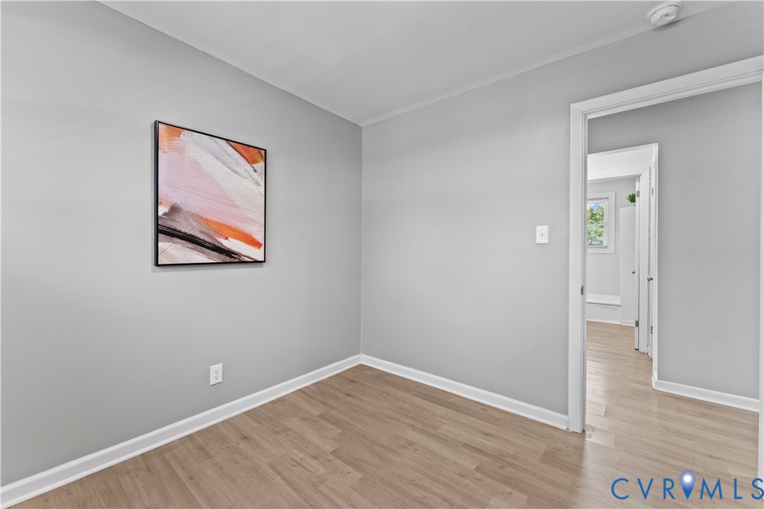 2000 Cleary Road Richmond, VA 23223 - Photo 24 of 28 Empty room with light wood finished floors and bas