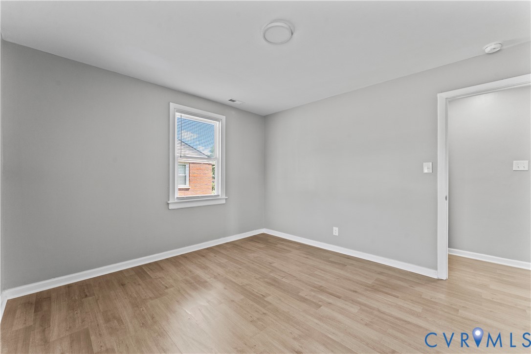 2000 Cleary Road Richmond, VA 23223 - Photo 26 of 28 Empty room with light wood-type flooring and baseb