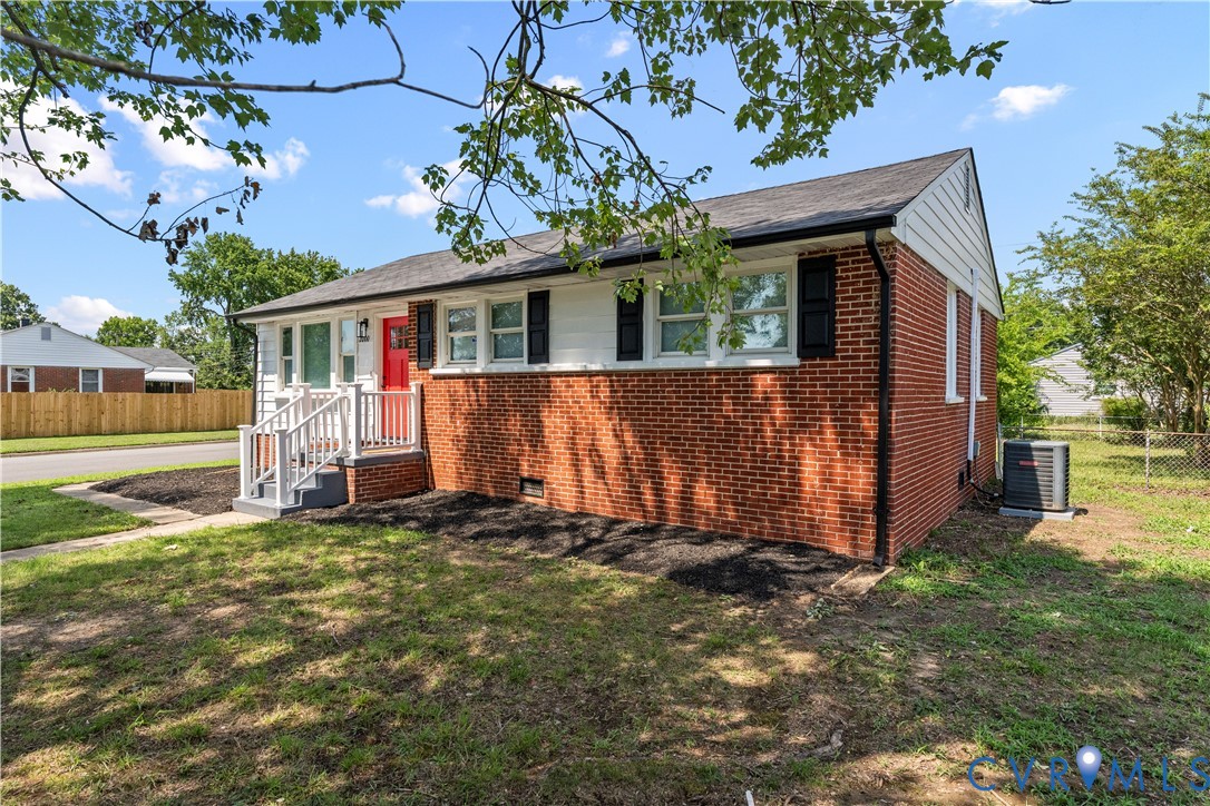 Bungalow-style home with brick siding and crawl sp