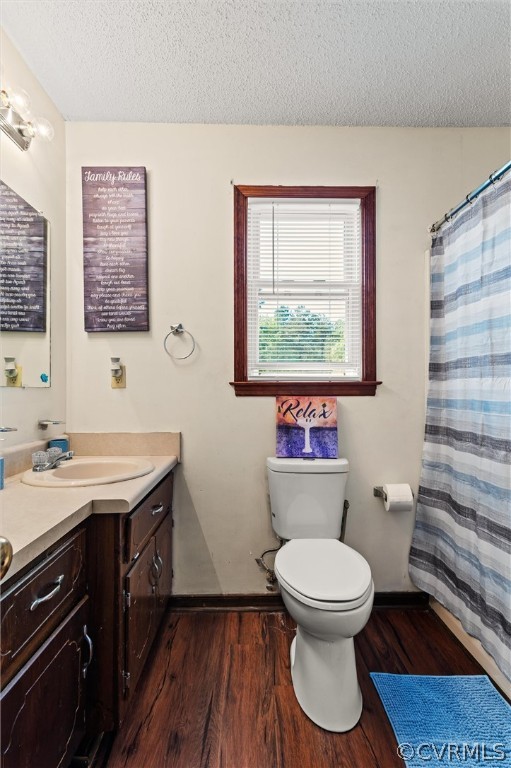 7329 Trailing Rock Road Prince George, VA 23875 - Photo 23 of 28 a bathroom with a toilet a sink and a mirror
