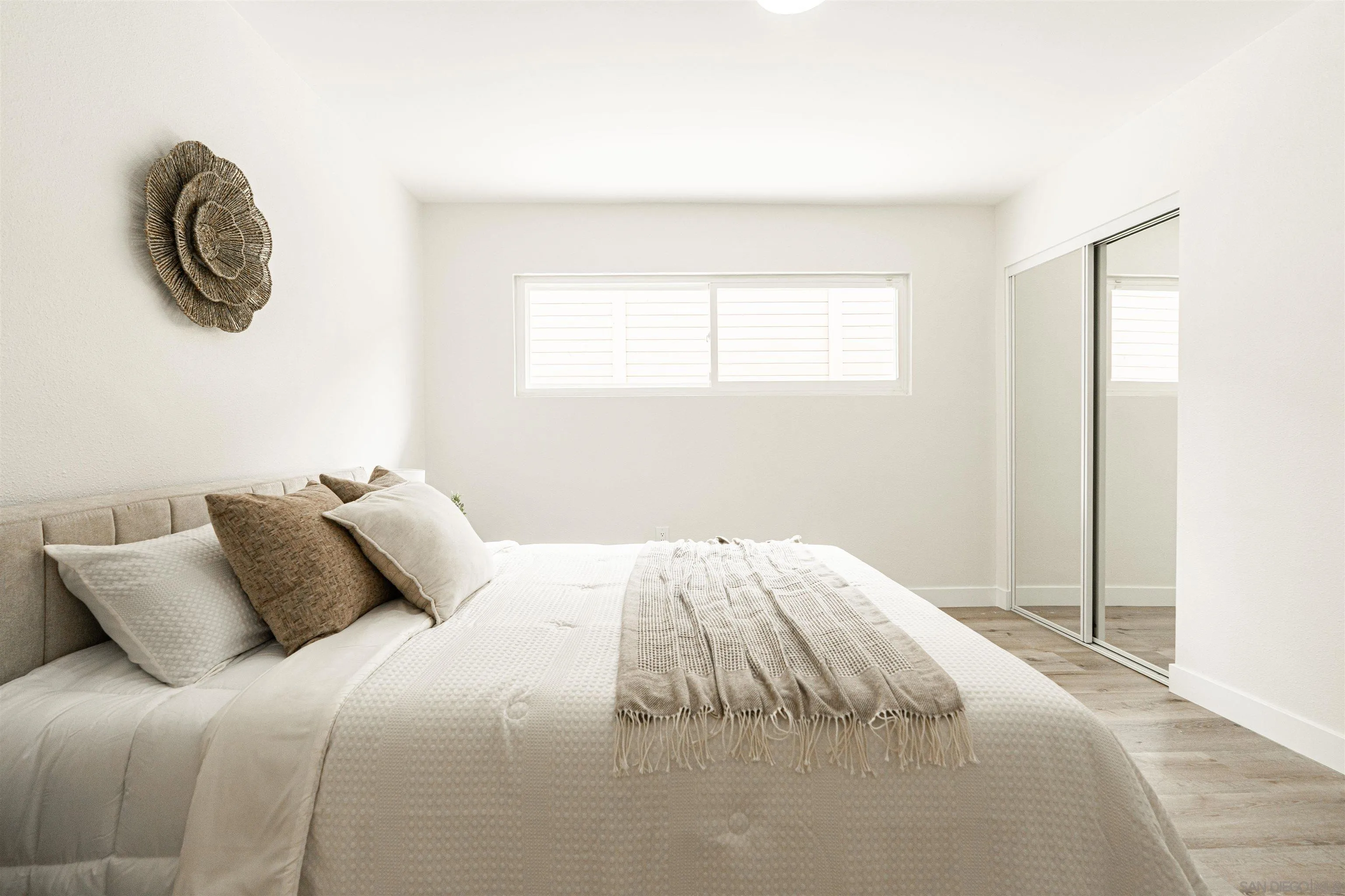 9376 Starcrest Drive Santee, CA 92071 - Photo 13 of 39 a bedroom with a bed and a window