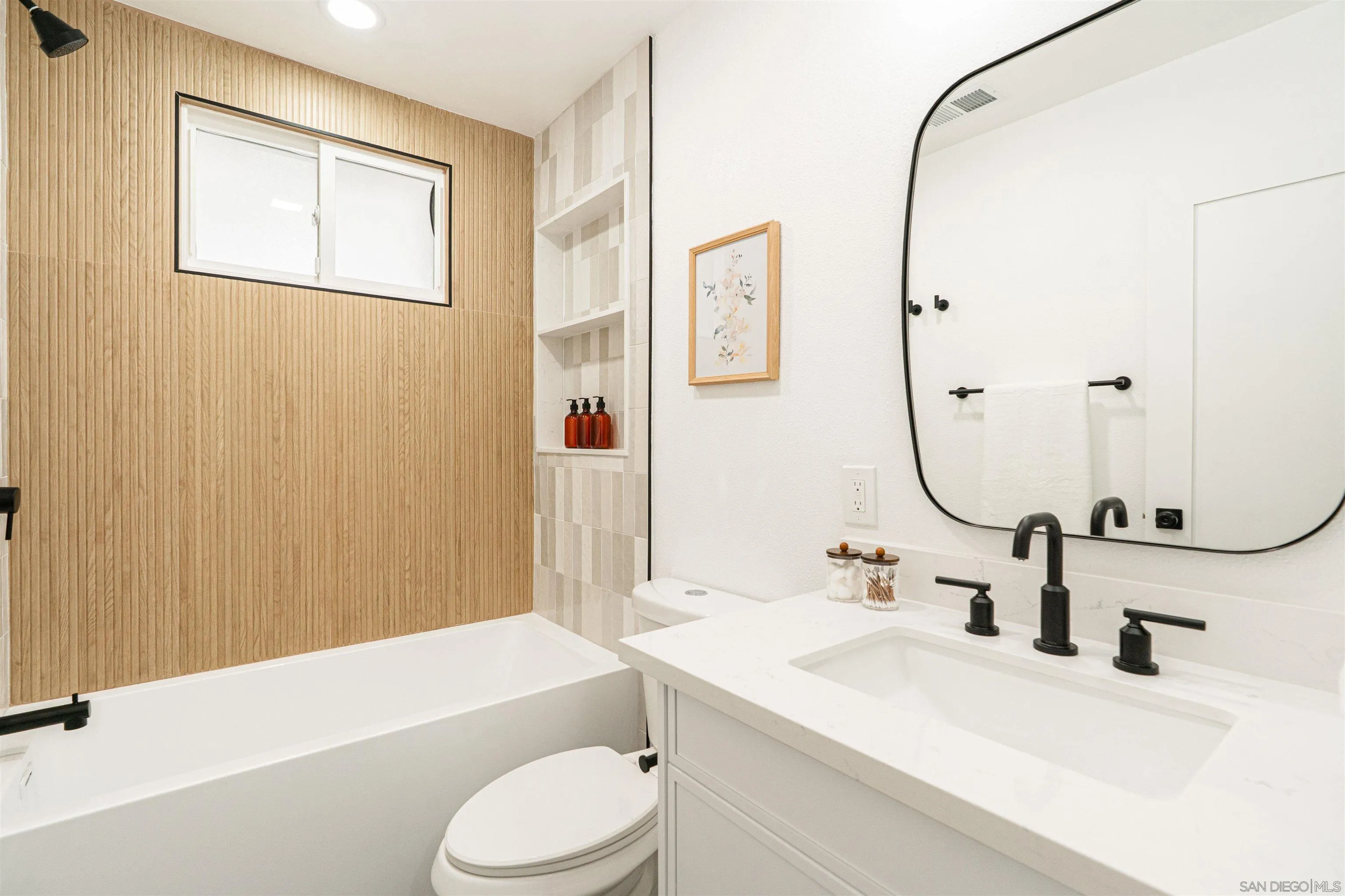 9376 Starcrest Drive Santee, CA 92071 - Photo 16 of 39 a bathroom with a sink toilet and shower