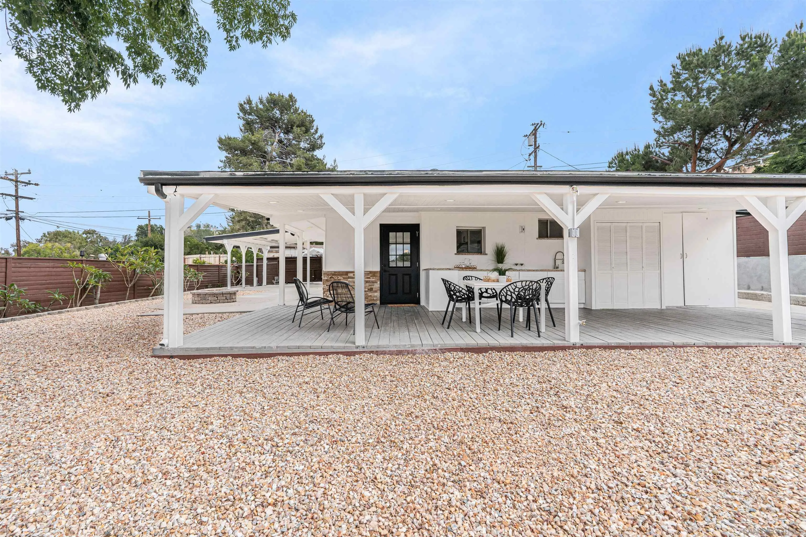 9376 Starcrest Drive Santee, CA 92071 - Photo 24 of 39 swimming view with outdoor seating