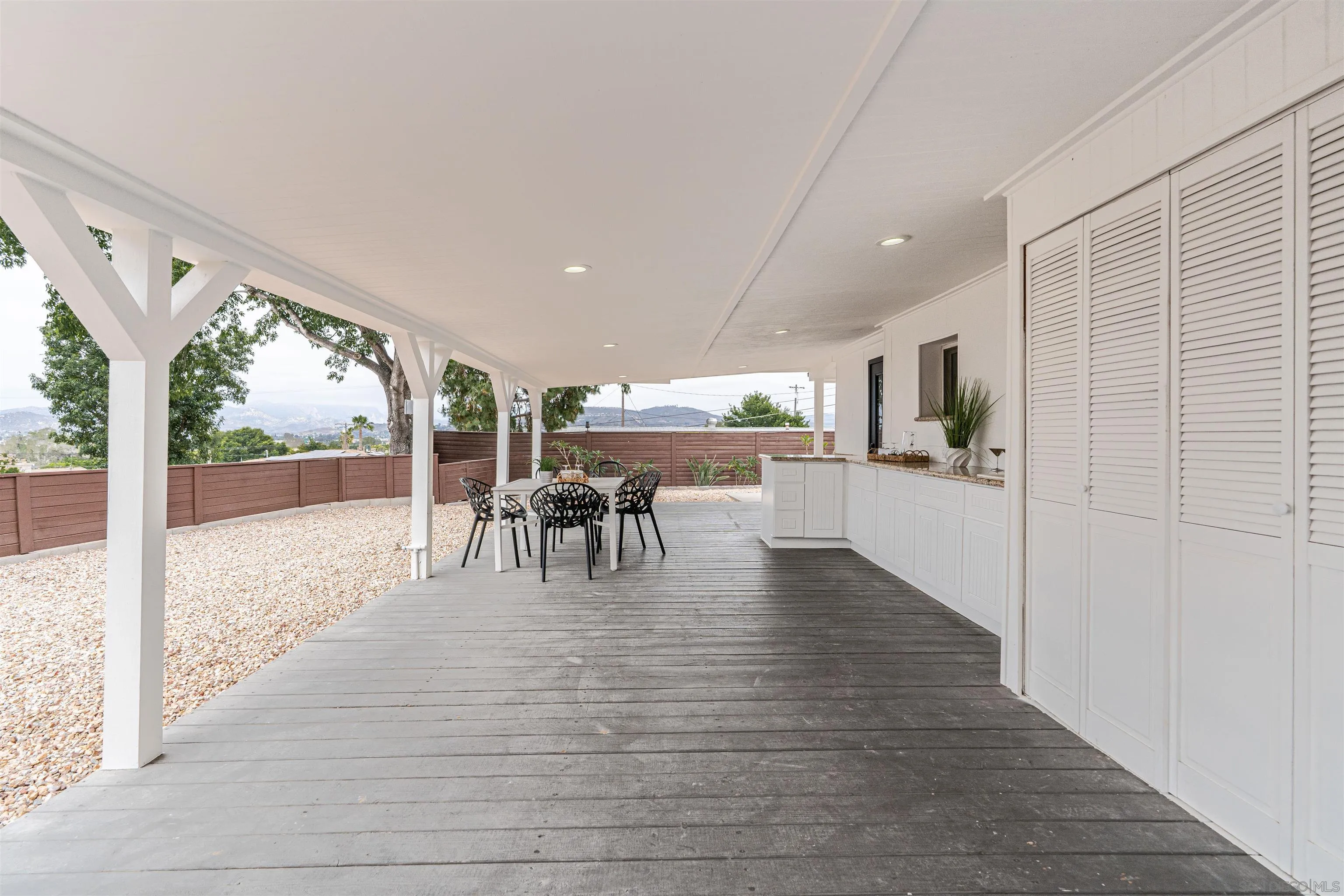 9376 Starcrest Drive Santee, CA 92071 - Photo 27 of 39 a view of dining room with furniture and wooden floor