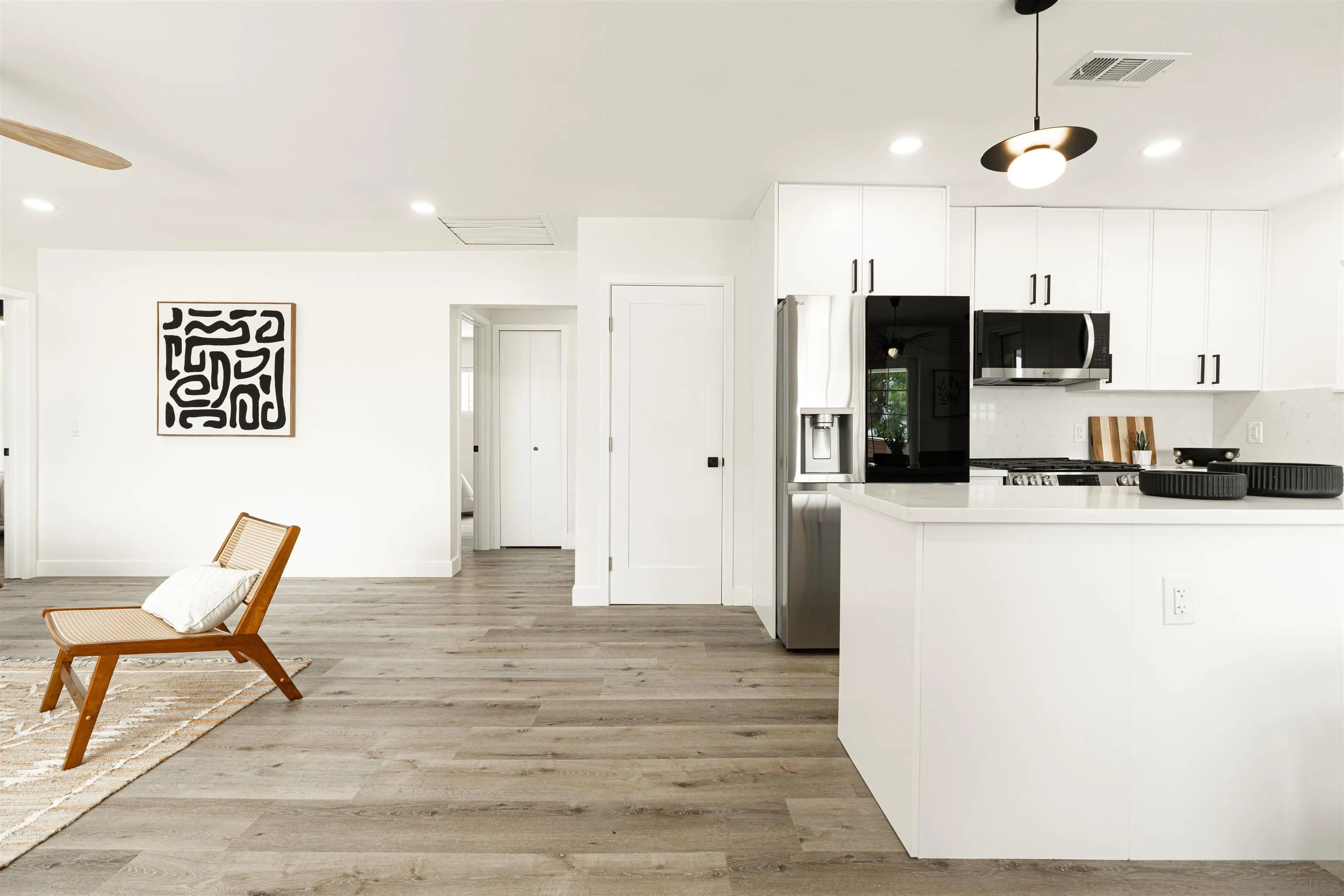 9376 Starcrest Drive Santee, CA 92071 - Photo 28 of 39 a view of kitchen with furniture and wooden floor