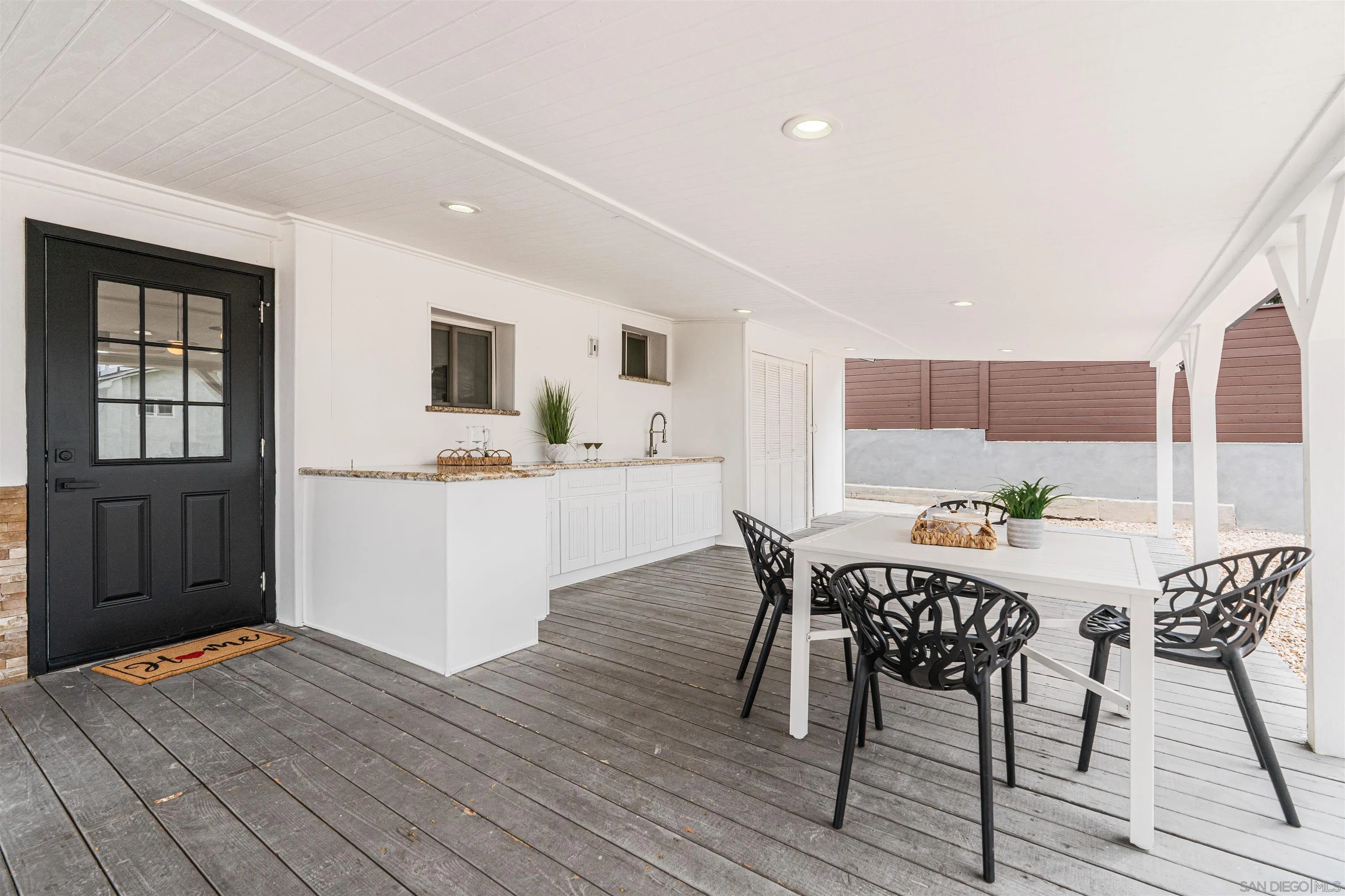 9376 Starcrest Drive Santee, CA 92071 - Photo 6 of 39 a view of a dining room with furniture and wooden floor