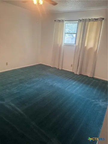 a bathroom with a sink and a window