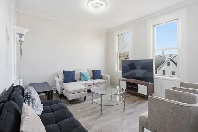 a living room with furniture and a couch