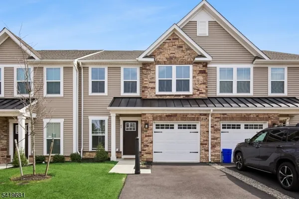a car parked in front of a house