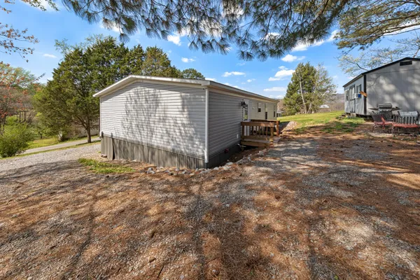 a view of backyard of the house