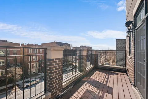 a view of city from a balcony