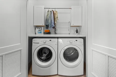 a utility room with dryer and washer