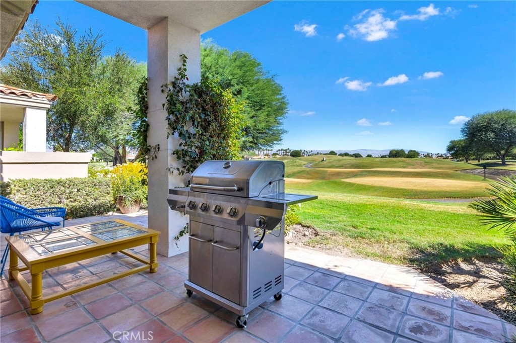 54880 Inverness Way La Quinta, CA 92253 - Photo 28 of 35 a view of a bench in front of a yard