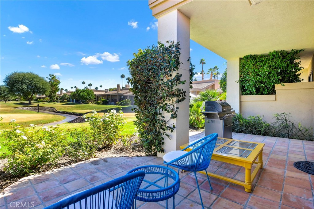54880 Inverness Way La Quinta, CA 92253 - Photo 31 of 35 a front view of a house with garden