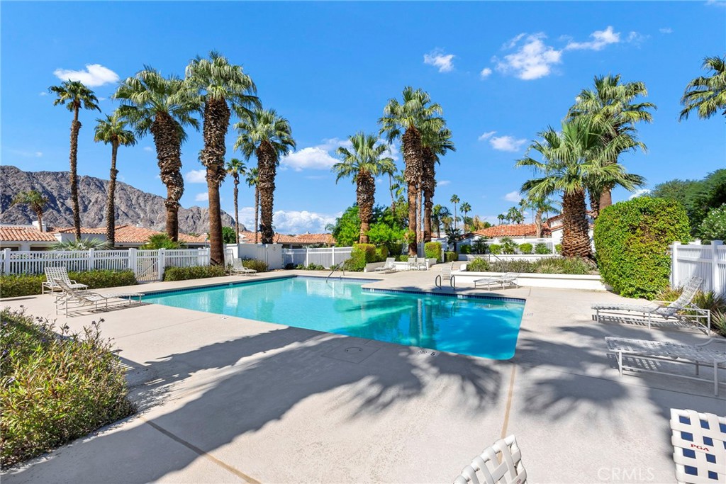 54880 Inverness Way La Quinta, CA 92253 - Photo 33 of 35 a view of a swimming pool with a patio and plants