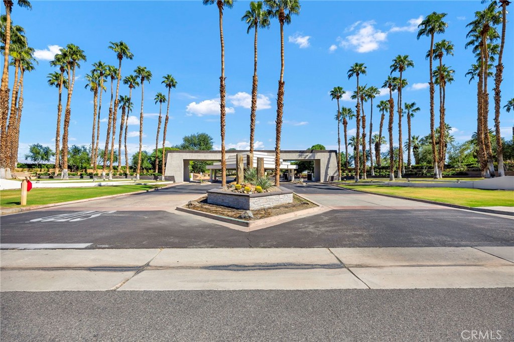 54880 Inverness Way La Quinta, CA 92253 - Photo 34 of 35 a view of a swimming pool with palm trees