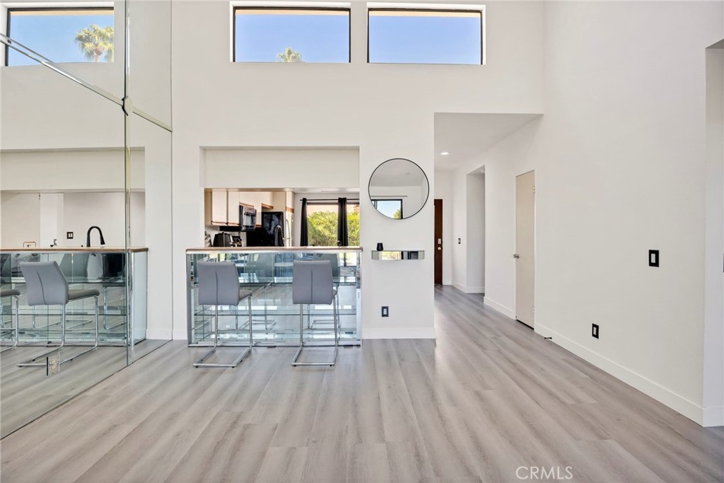 54880 Inverness Way La Quinta, CA 92253 - Photo 6 of 35 a living room with furniture and wooden floor