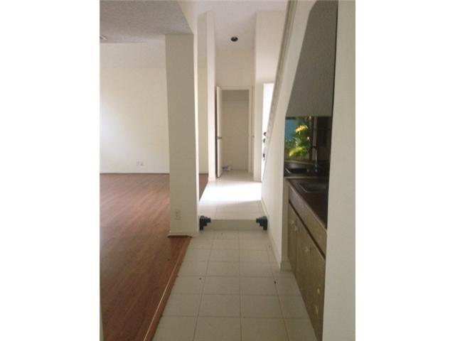 2186 Northwest 52nd Street Boca Raton, FL 33496 - Photo 11 of 23 a view of a hallway with a room