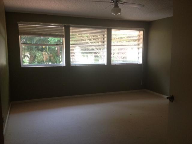 2186 Northwest 52nd Street Boca Raton, FL 33496 - Photo 12 of 23 an empty room with a window