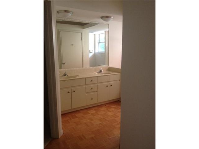 2186 Northwest 52nd Street Boca Raton, FL 33496 - Photo 13 of 23 a bathroom with a sink and a mirror