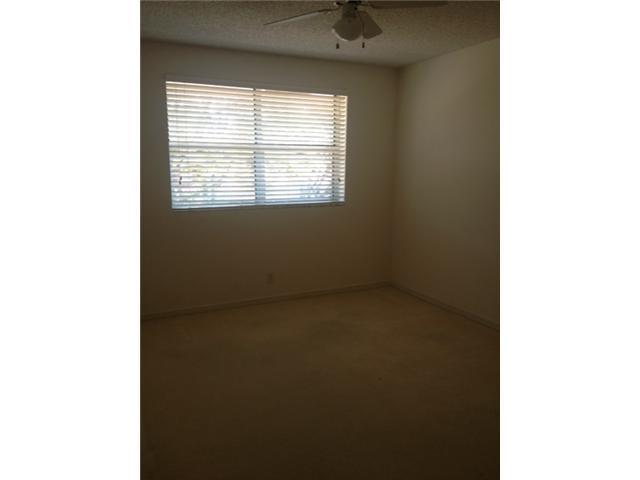 2186 Northwest 52nd Street Boca Raton, FL 33496 - Photo 17 of 23 a view of a room that has a window in it