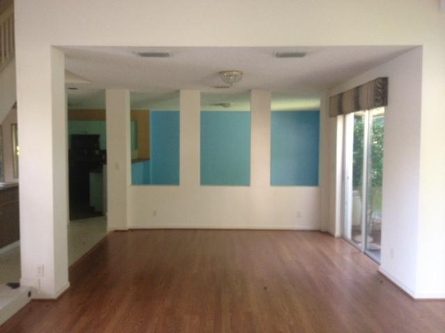 2186 Northwest 52nd Street Boca Raton, FL 33496 - Photo 5 of 23 wooden floor in an empty room and a window
