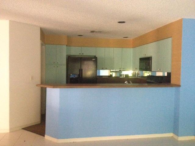 2186 Northwest 52nd Street Boca Raton, FL 33496 - Photo 9 of 23 a view of a living room with a sink