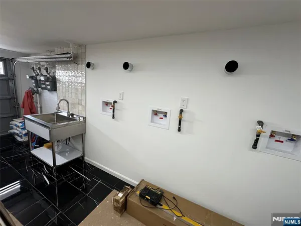 a room with furniture and gym equipment